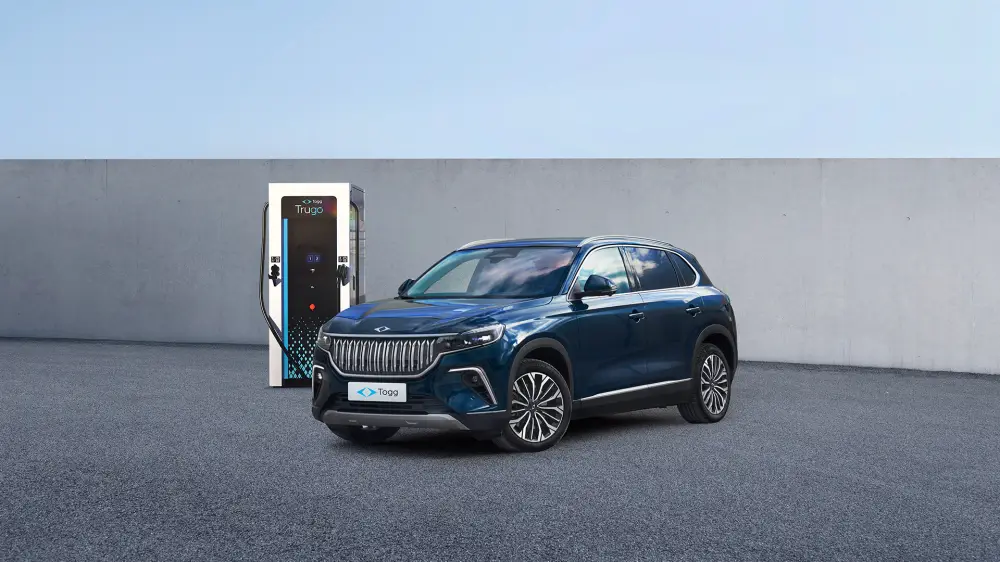 Electric car charging at a home charging station