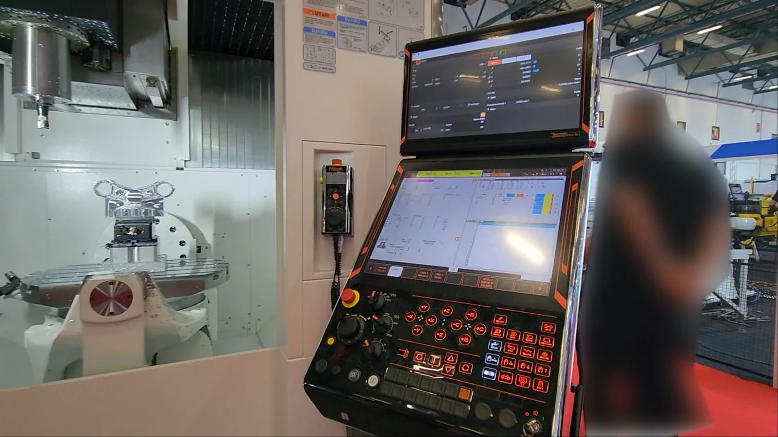 5-axis CNC machining center with its control panel at MAKTEK Eurasia 2026